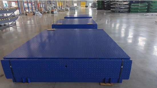 Línea de pulverización automática de nivel de muelle hidráulico gigante azul Color personalizado ISO 9001