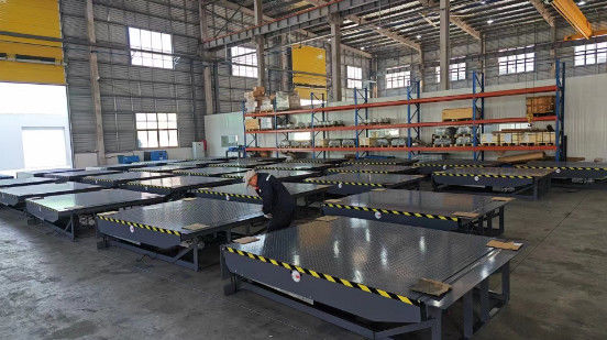 Nivelador automático estacionario hidráulico fijo para el muelle de carga de pozos para bahías de carga de almacén logístico