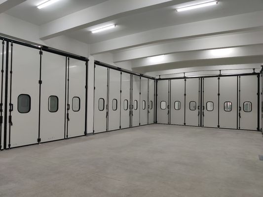 Puertas plegables grises sin motor con bisagras de hierro fundido